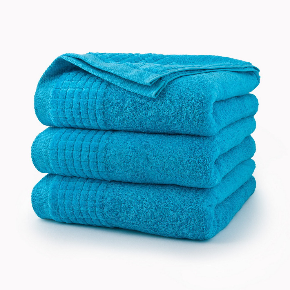 Спадающее полотенце. Махровое полотенце (Terry Towel) 70x50 см. Полотенце Терри Люкс. Стопка полотенец. Бирюзовое полотенце.